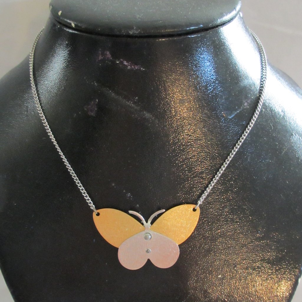 Avon Gold Tone And Silver Tone Butterfly Necklace